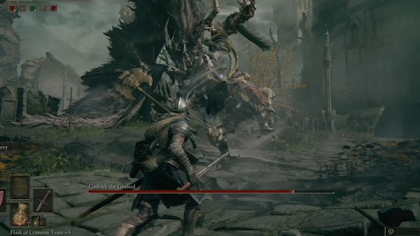 In-game action shot of Godrick rolling towards the player character