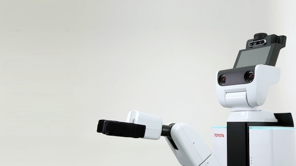 Cute little black and white robot holding its hand up
